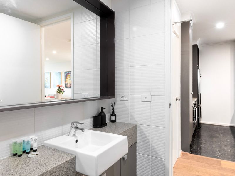 Well-kept bathroom with essentials provided