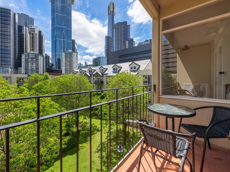 Balcony views that take in the lush greenery and the stunning skyline—your own urban retreat.