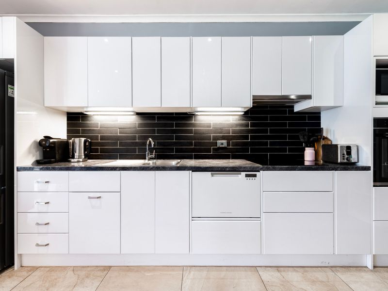 A well-designed kitchen with modern appliances to create your favorite meals.