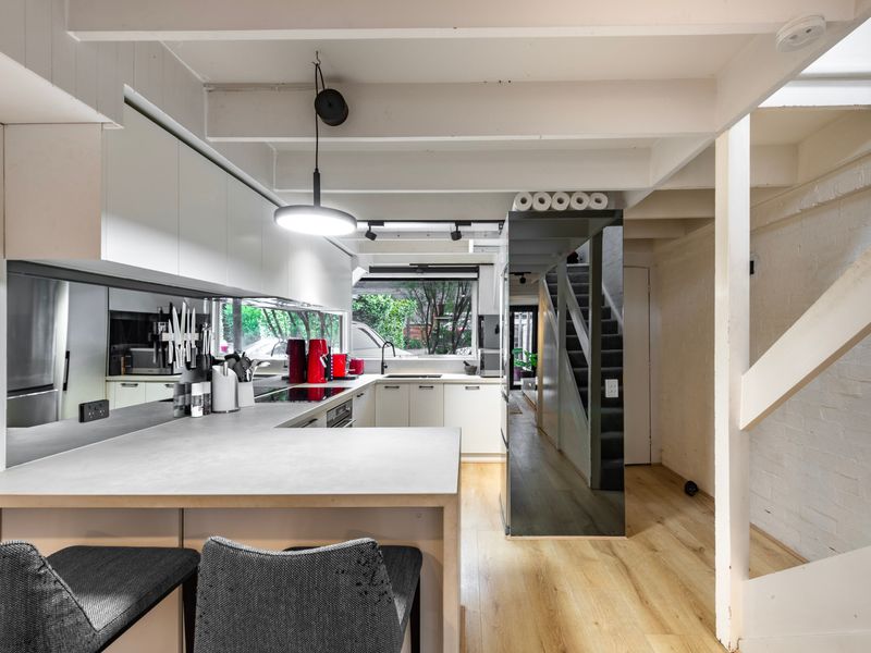 Contemporary kitchen with generous bench space and natural light.