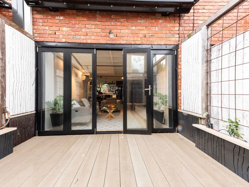 Private outdoor deck with direct access to the living area.