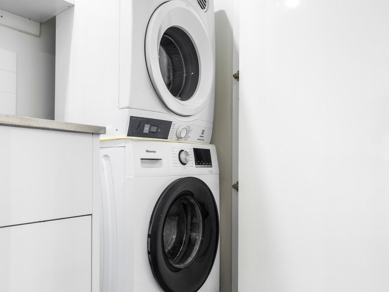 Convenient washer and dryer setup for longer stays.
