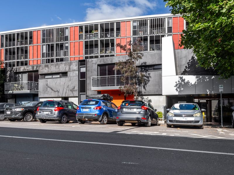 Modern apartment complex set in a leafy, convenient urban location.