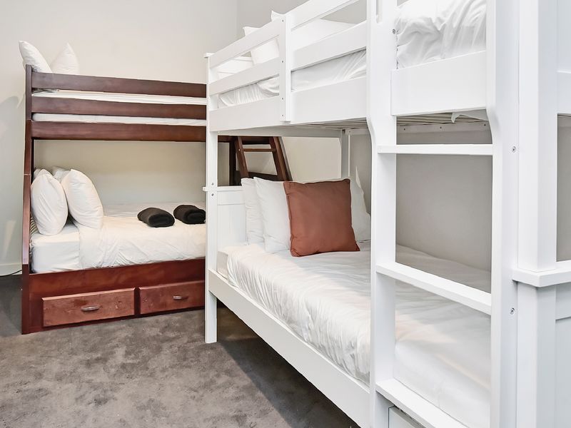 The kids (and the young at heart) will love this fun bunk room — their own little retreat after a beach day.