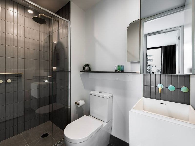 Contemporary bathroom with walk-in shower and quality fixtures.
