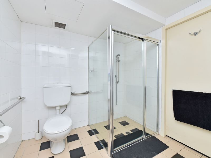 Clean and modern bathroom with walk-in shower