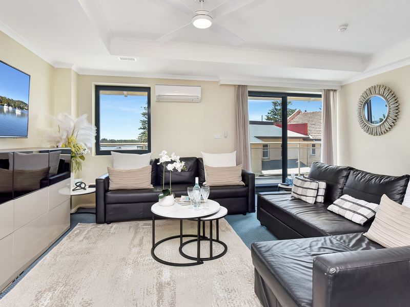 Warm and inviting living room with a smart TV for your entertainment.