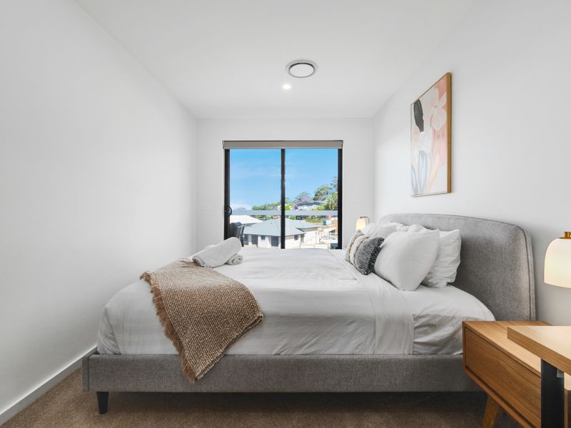 Bright bedroom with serene views and natural light