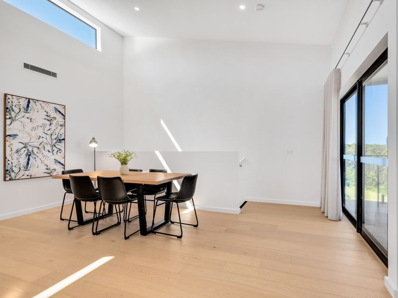Dining nook with beautiful outlook and balcony access