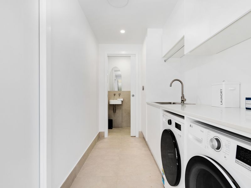 Fresh hallway leading to utility and storage areas