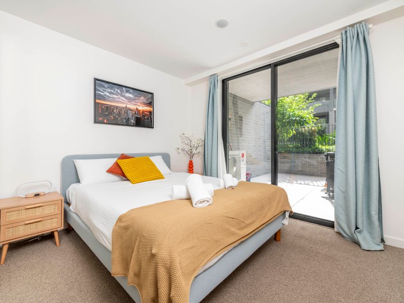 Bright, clean bathroom with all essentials provided.