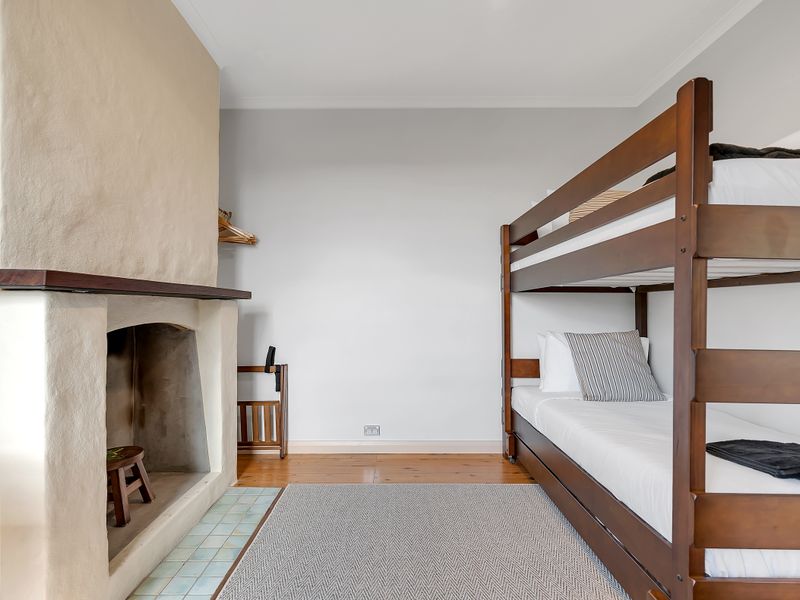 Cozy bunk bedroom ideal for groups or families.