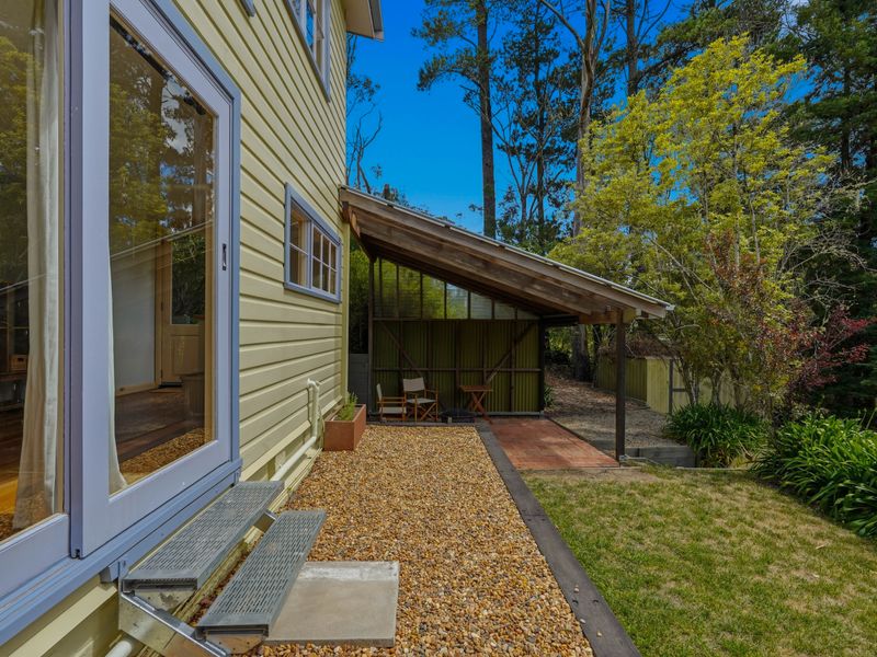 Private entryway with direct access to the outdoor garden path.