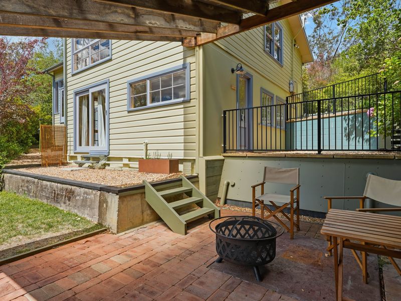 Charming outdoor patio with seating—perfect for morning coffee or sunset wine.
