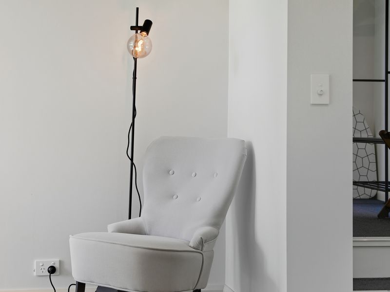 Cozy reading corner with soft lighting.