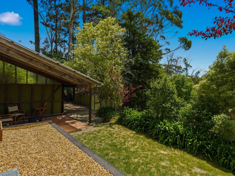 Covered outdoor walkway ideal for shaded lounging or morning strolls.