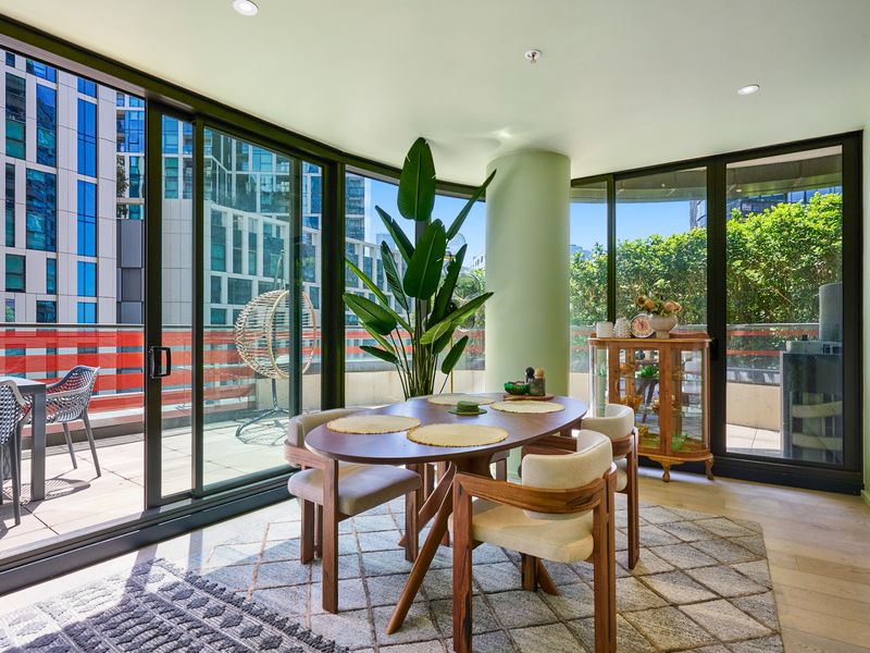 Open dining area flowing to a spacious balcony—perfect for morning coffee.