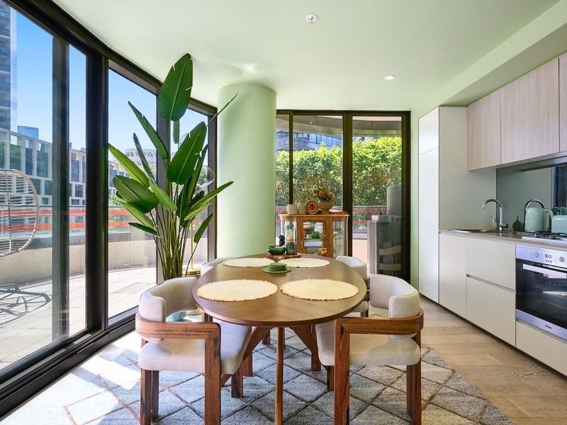 Light-filled dining area overlooking greenery for relaxed meals.