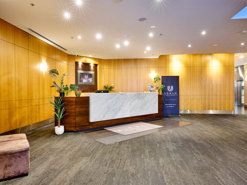 Hotel-style lobby with warm lighting and welcoming atmosphere