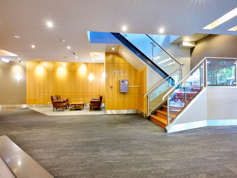 Spacious reception area with modern décor and lounge seating