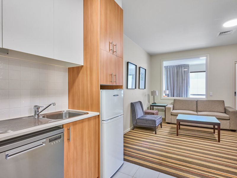 Fully equipped kitchenette with essential appliances