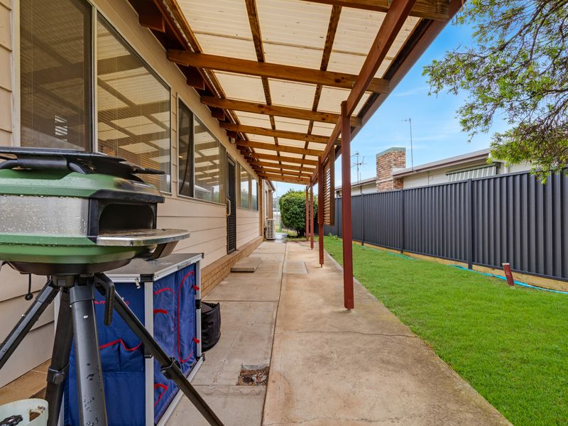 Sheltered space with BBQ and seating