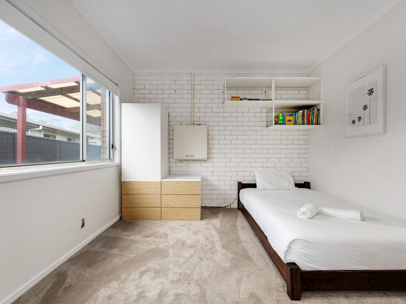 Comfortable bedroom with garden access and plenty of light