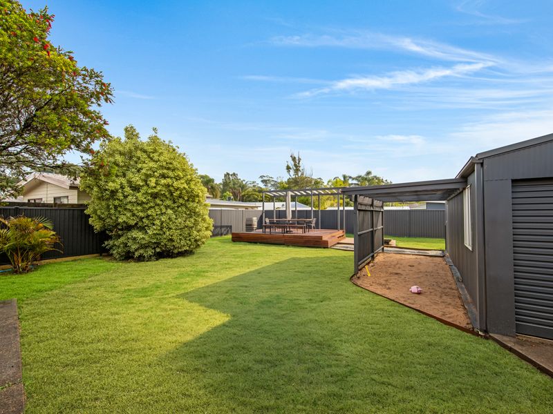 Spacious grassy yard for relaxing or play