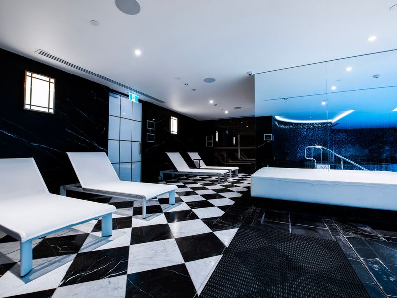 Relaxation lounge beside the pool, ideal for unwinding.