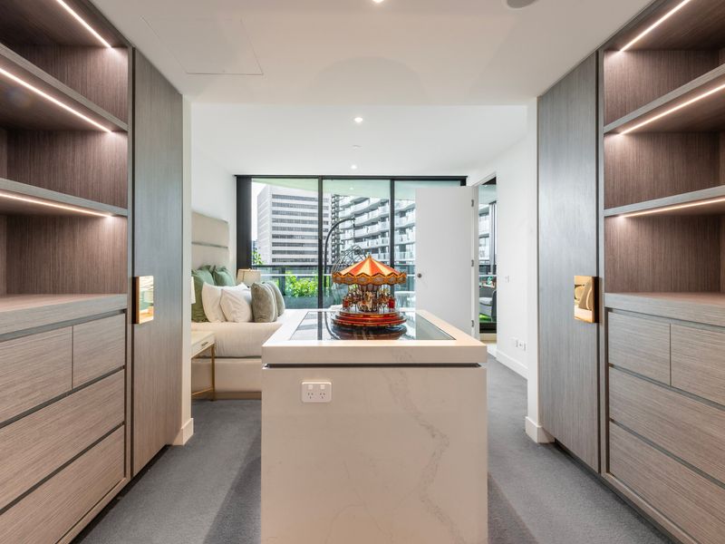 Walk-in wardrobe with generous storage space.