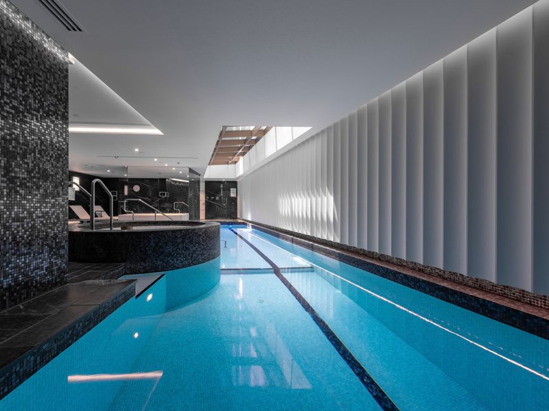 Pool area with sleek modern finishes and calm ambience.