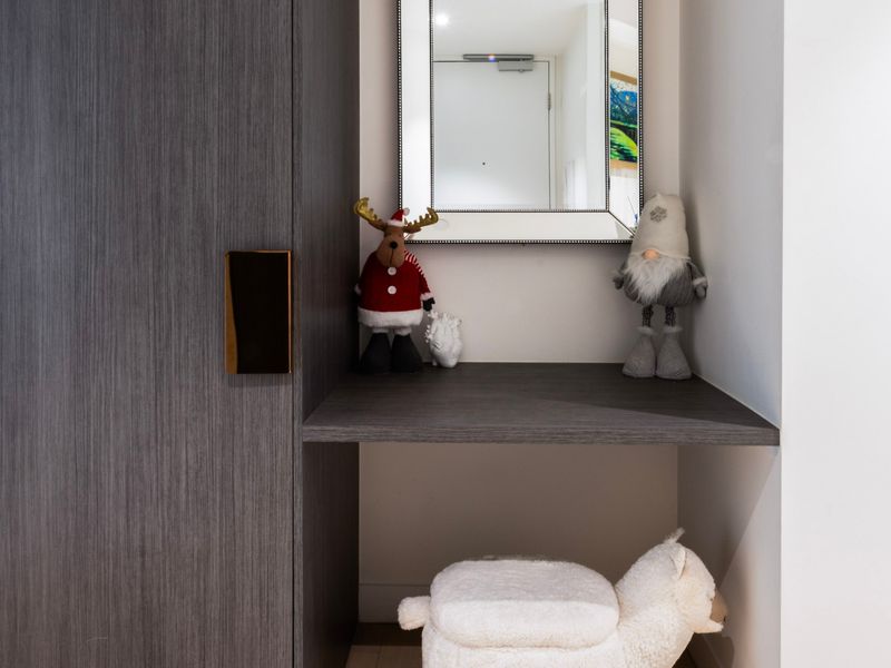 Small study nook perfect for quick work or makeup prep.