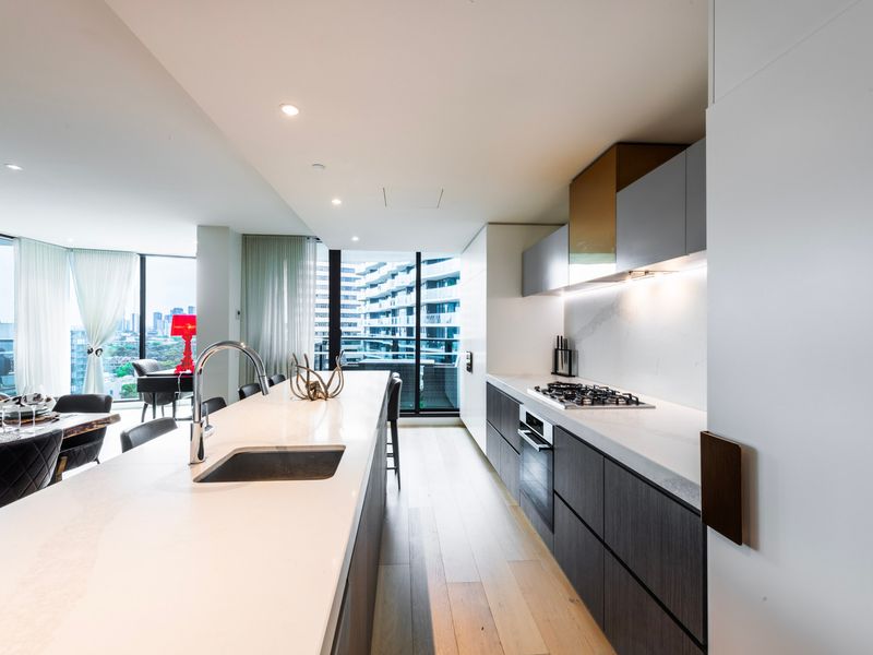 Sleek contemporary kitchen with premium appliances.