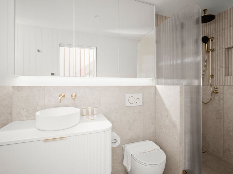 Modern bathroom with walk-in shower and vanity