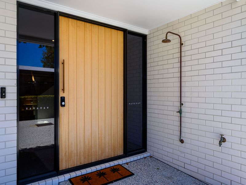 Stylish front entrance with keyless access for smooth check-ins.