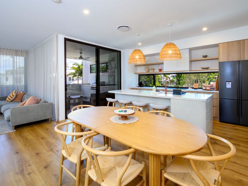 Sun-filled living and dining space overlooking the garden.