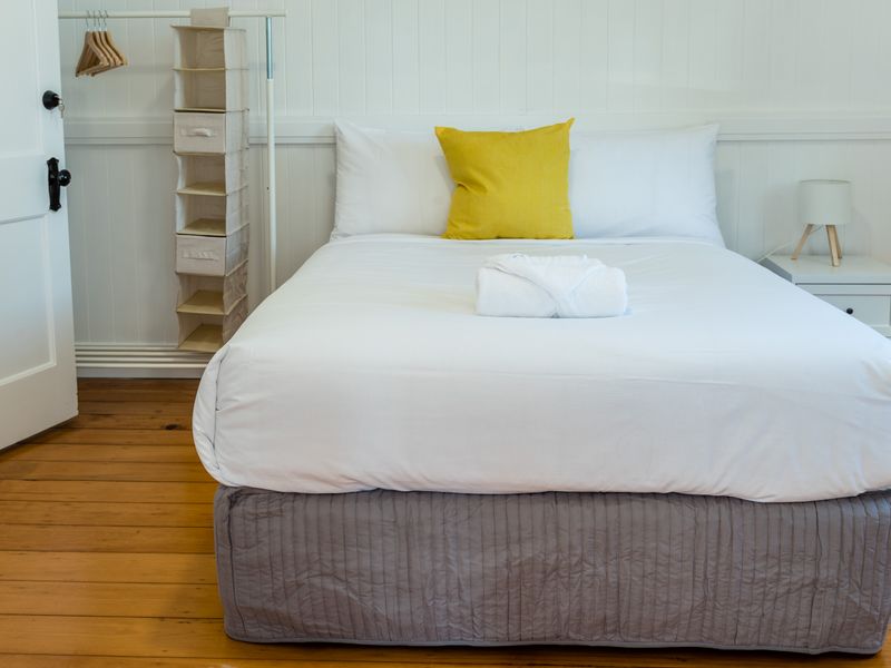 Inviting main bedroom with fresh linens
