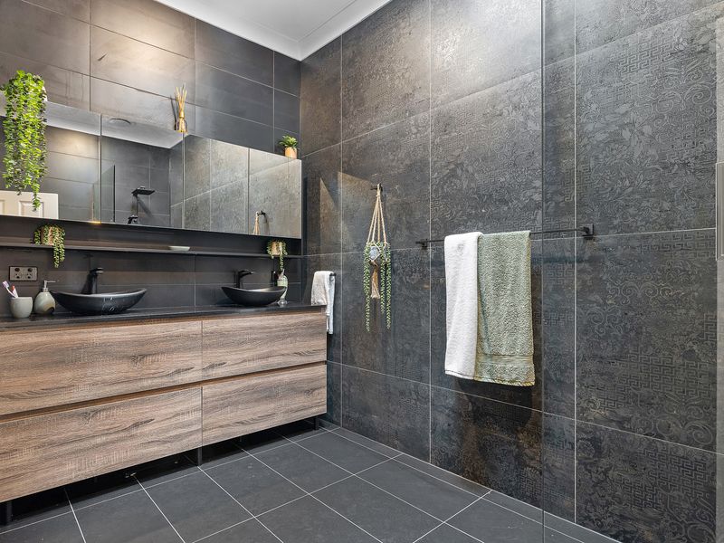 Modern bathroom with spacious walk-in shower and sleek finishes
