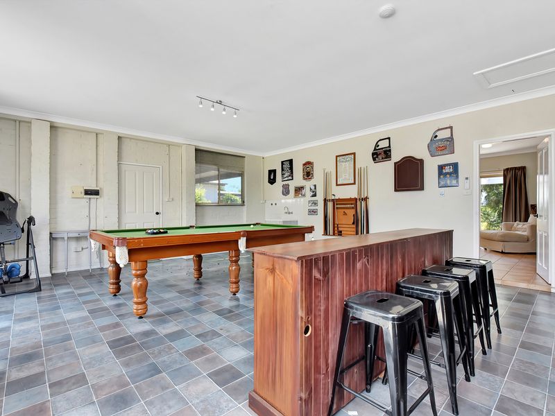 Pool table and dining area combining relaxation and entertainment