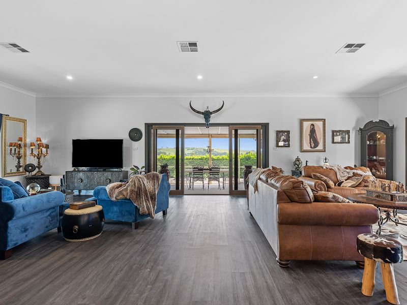 Airy open living space with multiple lounge areas.