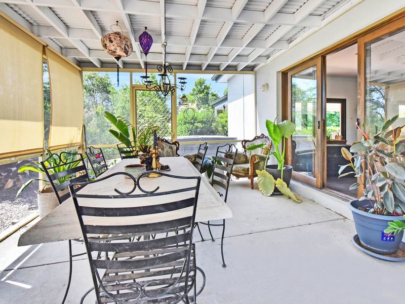 Another view of the covered outdoor area with garden outlook