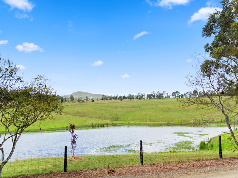 Peaceful acreage views with a sparkling dam and open paddocks