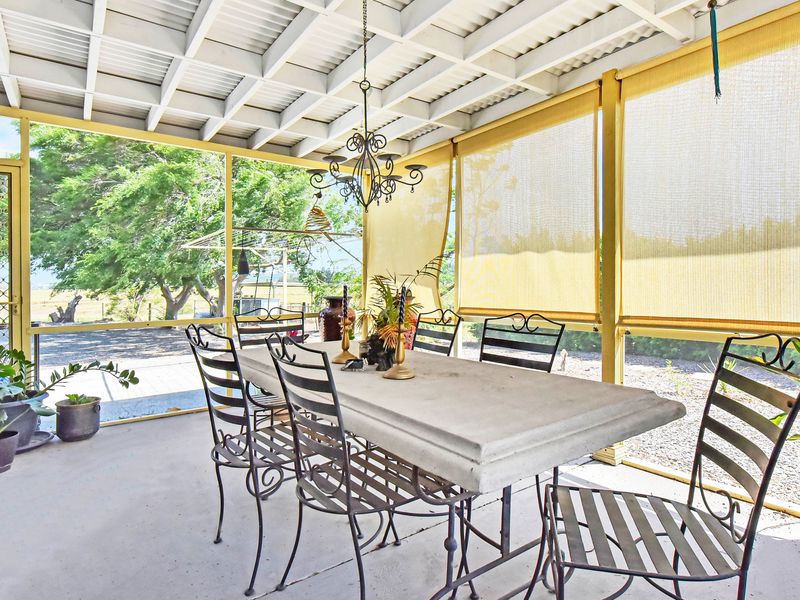 Breezy alfresco dining patio perfect for long, relaxed meals