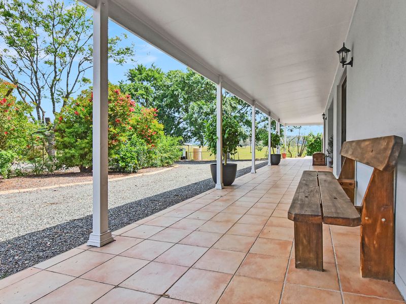 Covered walkway with garden outlook leading to the main living areas