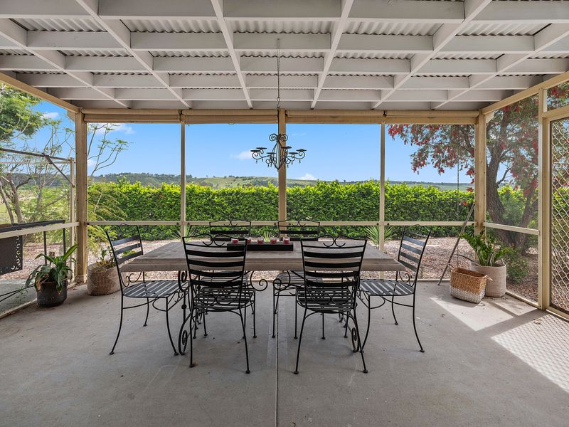 Covered outdoor dining perfect for relaxed afternoons.