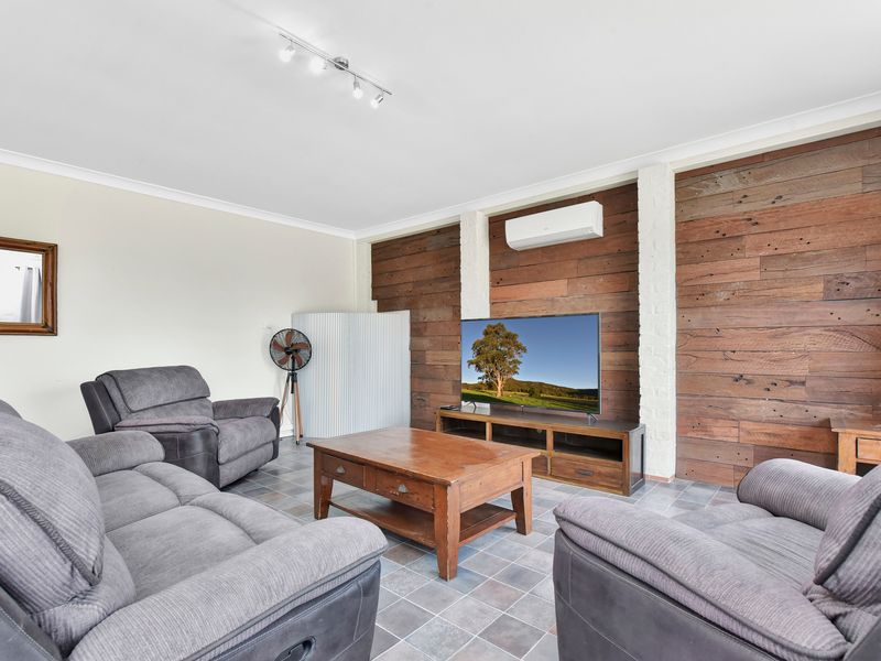 Comfortable lounge area with warm timber accents