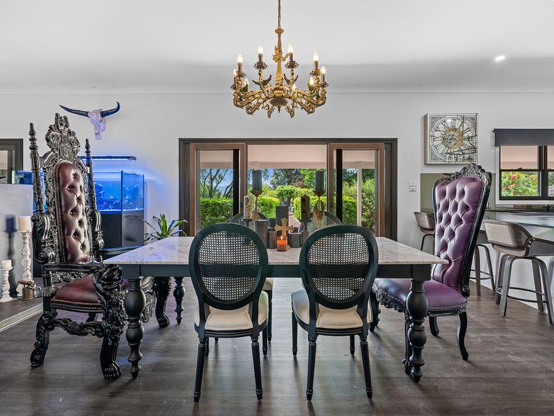Grand dining setting overlooking the garden.