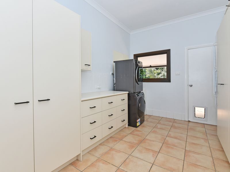 Bright utility room with generous storage and practical layout