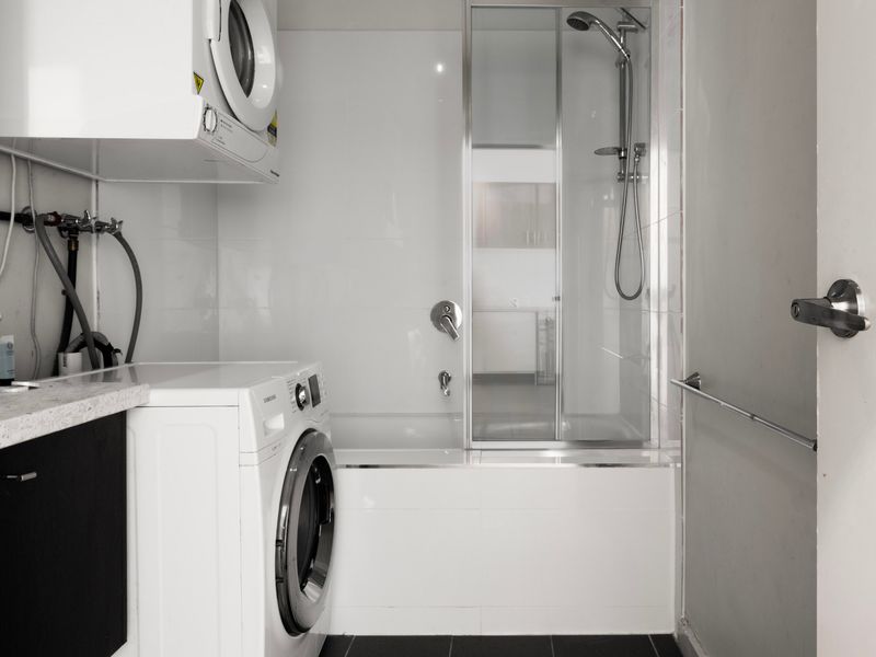 Convenient in-apartment laundry facilities with washer and dryer for longer stays.