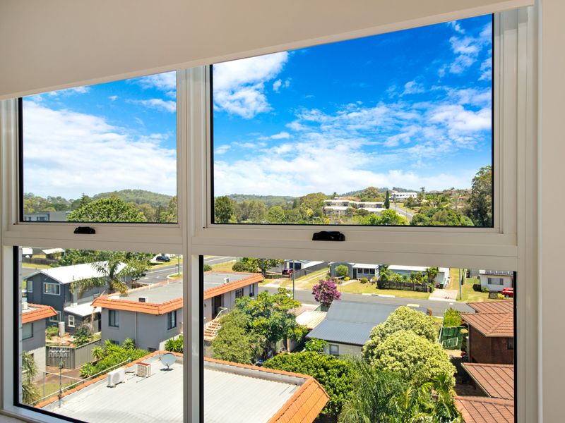 Large windows offering leafy neighbourhood views